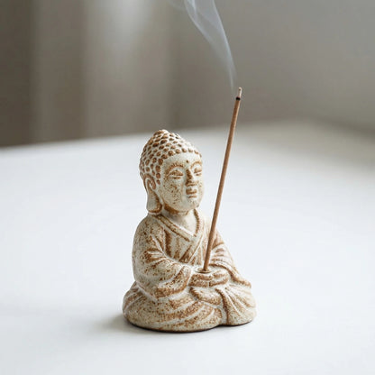 rustic ceramic Little Buddha incense holder with burning incense stick for meditation decor